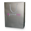 Matte laminated paper shopping bags printed with 1 metallic color and 1 dayglo color